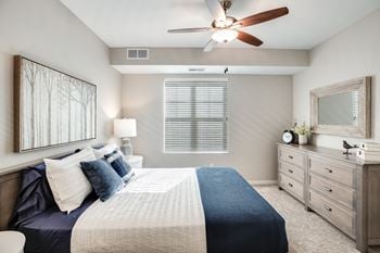 Primary bedroom featuring a ceiling fan